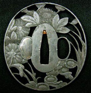 A Japanese sword guard that is typically made of iron or leather.